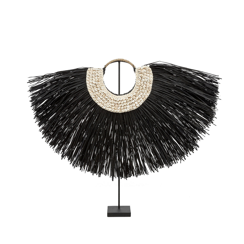 The Alang Cowrie on Stand